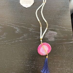 Rapsodia necklace with tags.